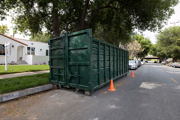 dumpster being used to clear out garage